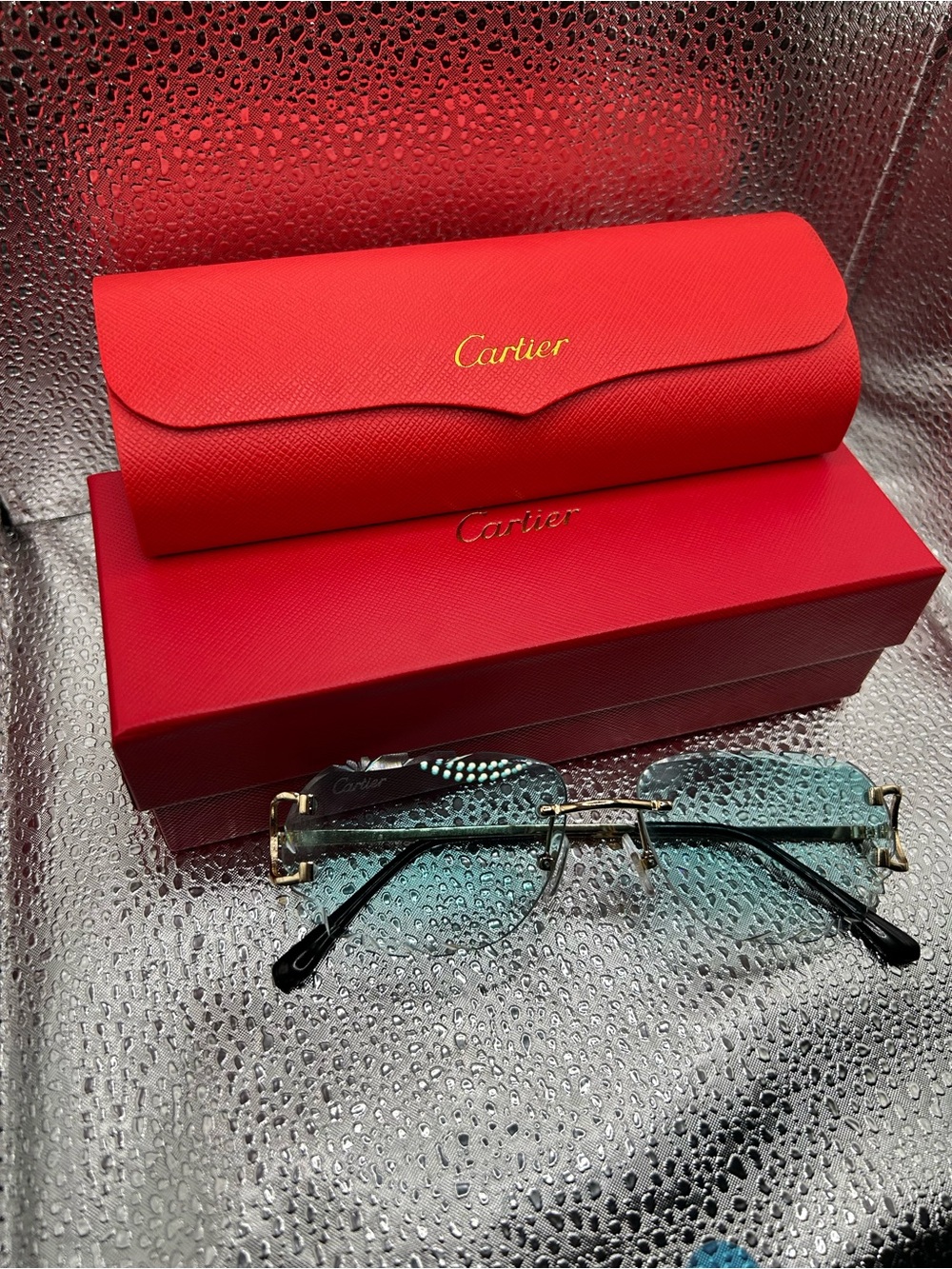 Carti Rimless Sunglasses with Light Blue Lenses and Gold Accents